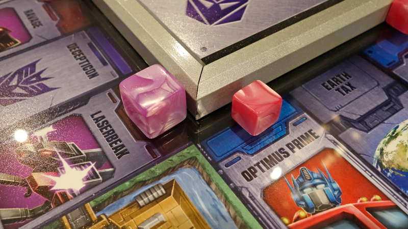 Illustration for article titled Transformers Monopoly Is a Work of Art You Can Actually Hang on a Wall